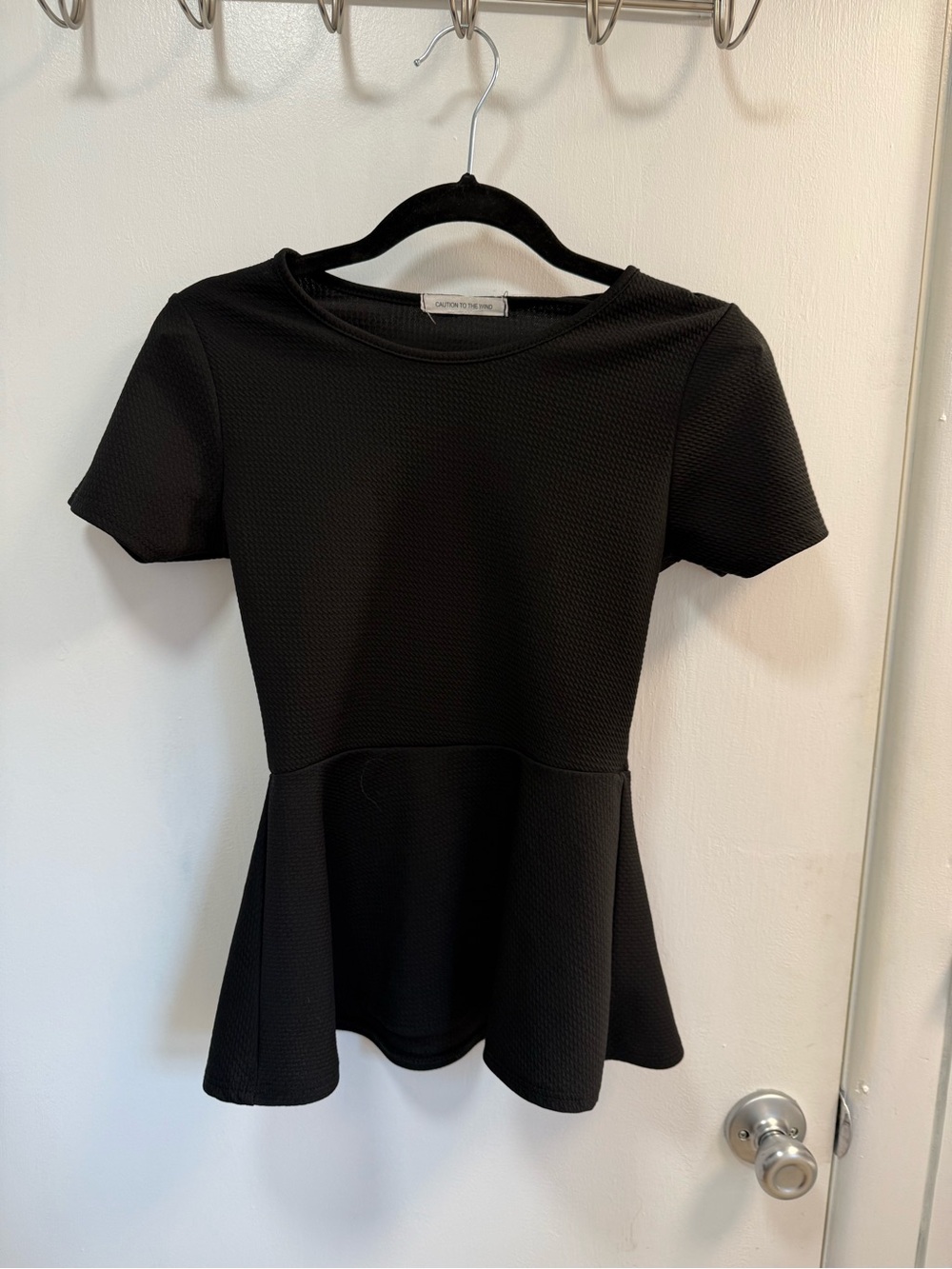 Caution To The Wind Black Textured Peplum Short Sleeve Top